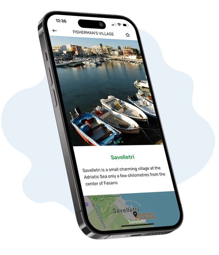 Travel App on smartphone showing seaside village overview, and displaying an image of boats in a harbor